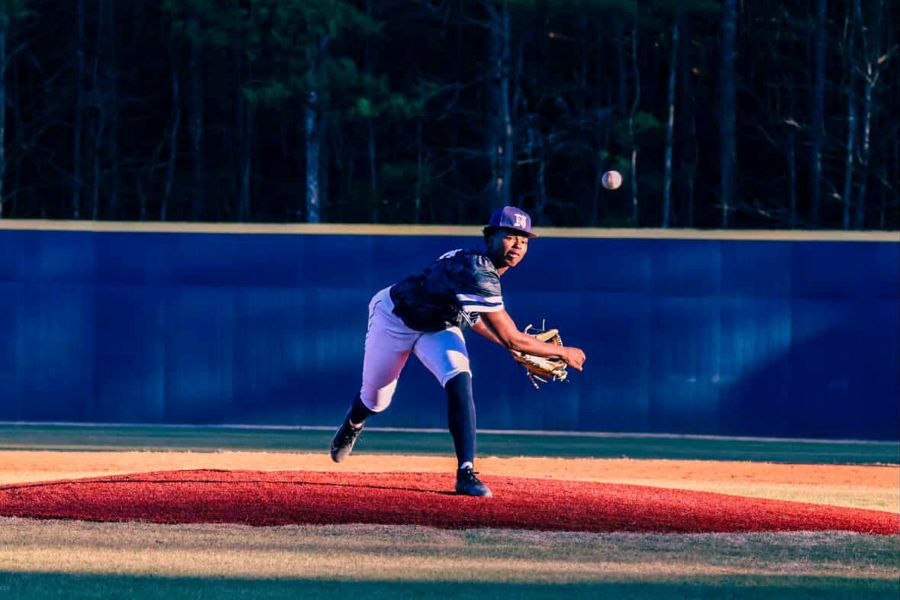 Photo of Tommie throwing a pitch